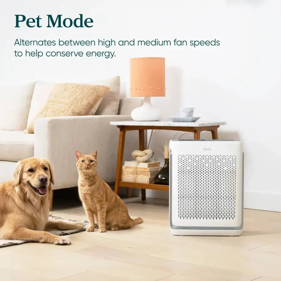 Levoit Vital 200S-P Smart Air Purifier running Pet Mode next to a dog and cat.